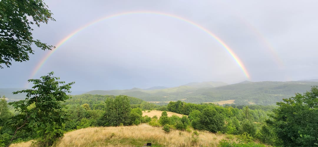A full rainbow over the valley