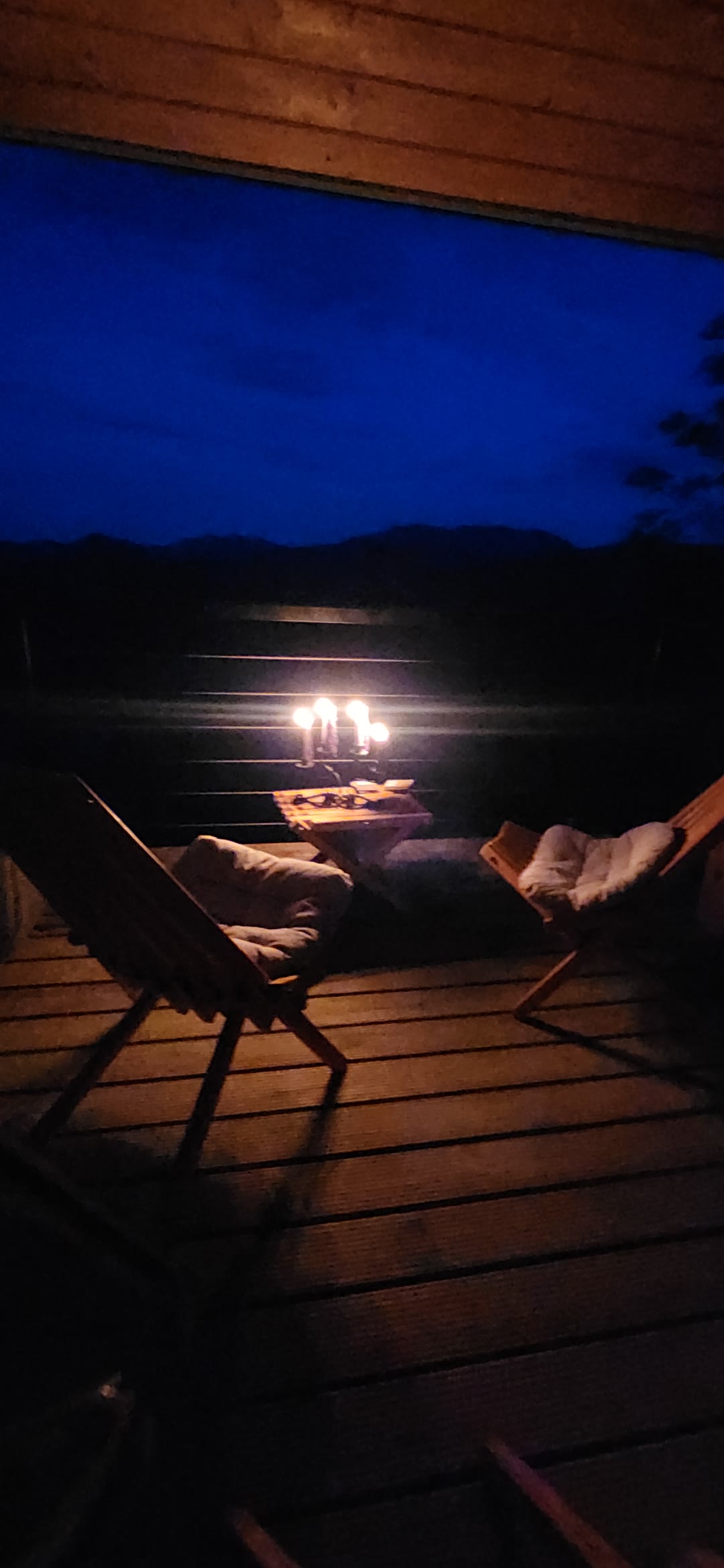 Candles on the terrace table at night