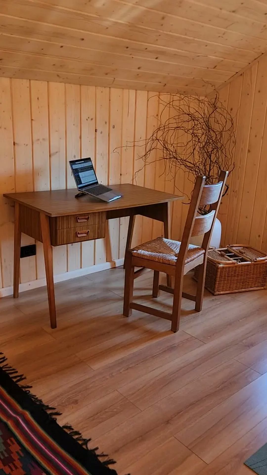 The desk upstairs under the timber roof